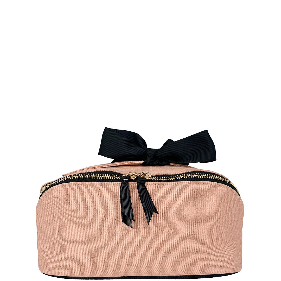 Bag-all Accordion Box Makeup & Toiletry in Pink/Blush. Elegant travel organizer with gold zippers and a black ribbon for a chic touch