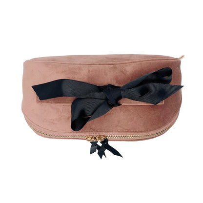 Bag-all Accordion Box Makeup & Toiletry in Pink Velvet, elegantly folded with a black ribbon. Compact, stylish, and perfect for travel organization