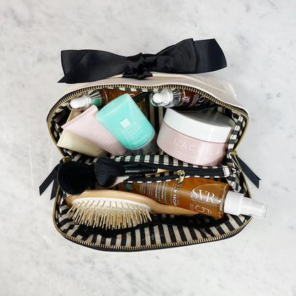 Bag-all Accordion Box Makeup & Toiletry in Cream, neatly packed with beauty essentials. Perfect for organizing skincare and cosmetics