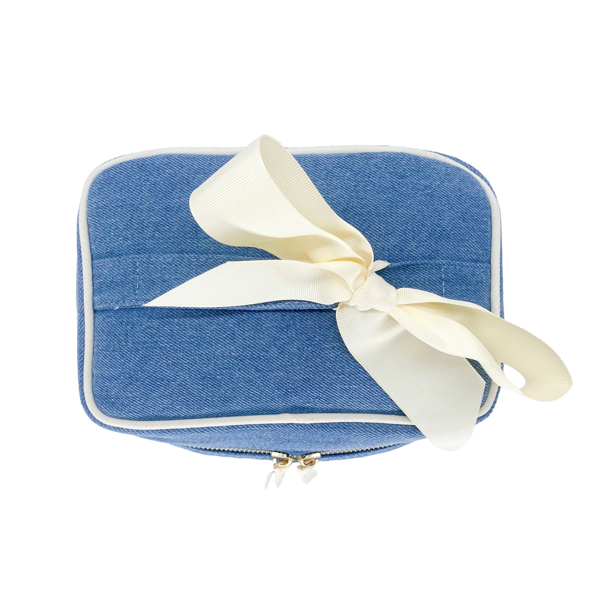 Bag-all My Makeup Cosmetic Box in stylish denim fabric with elegant cream bow, featuring waterproof interior and spacious square design for organized beauty storage