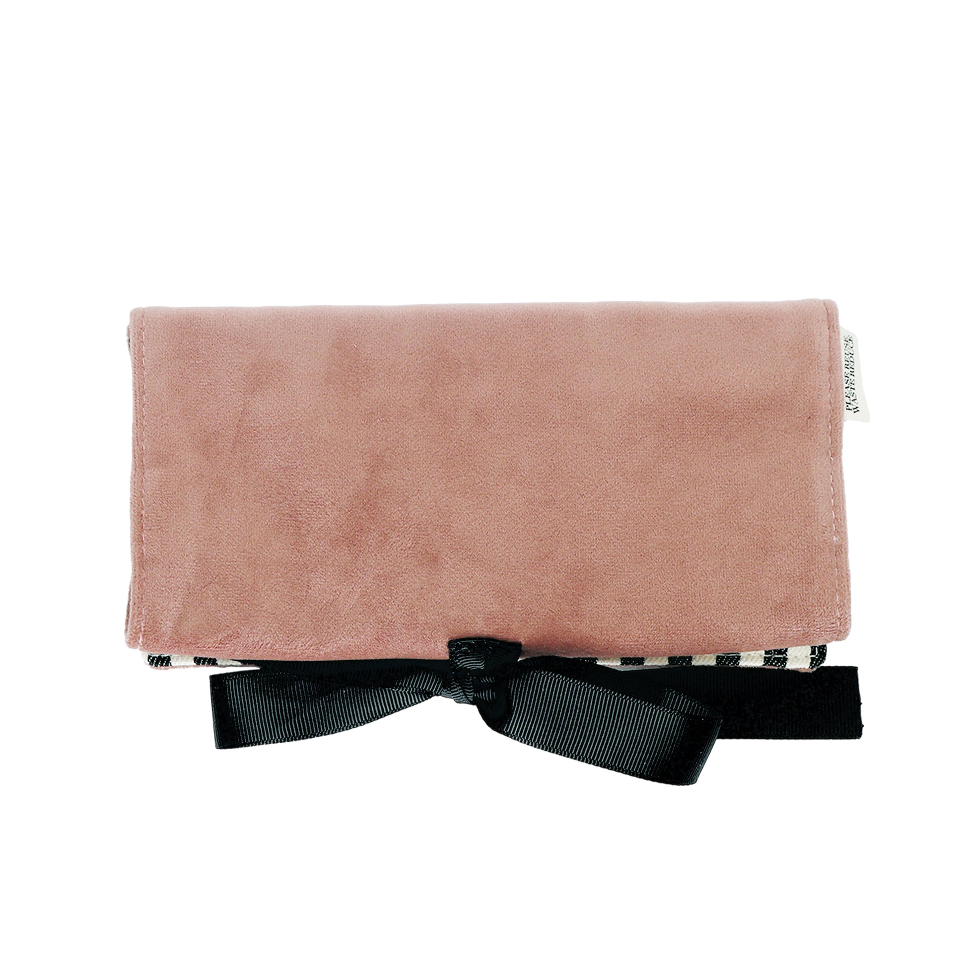 Bag-all Couture Jewelry Roll Medium in pink velvet with black bow, featuring three zipper compartments and leather earring holder for elegant jewelry storage and travel