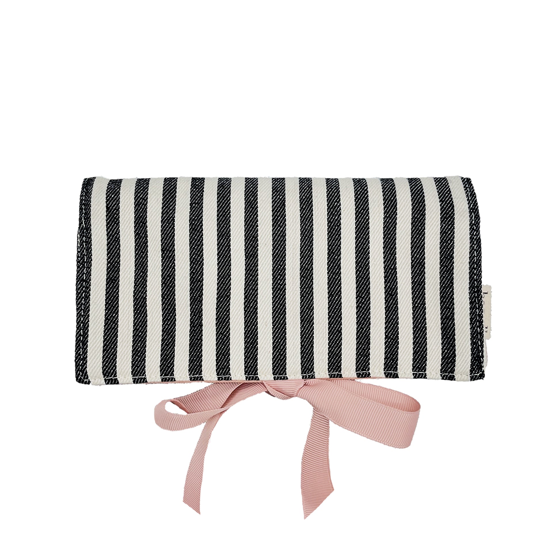 Bag-all Couture Jewelry Roll Medium in black and white stripes with pink bow, featuring three compartments, leather earring holder and ring storage for organized travel