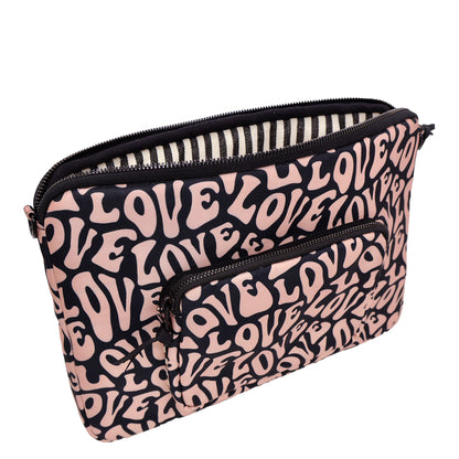 Bag-all padded laptop case with love pattern design, featuring striped interior, front charger pocket and secure zipper. 13-inch eco-friendly sleeve in pink and black