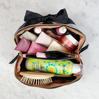 Bag-all Accordion Box Makeup & Toiletry in Pink/Blush, neatly packed with beauty essentials. Perfect for organizing skincare and cosmetics