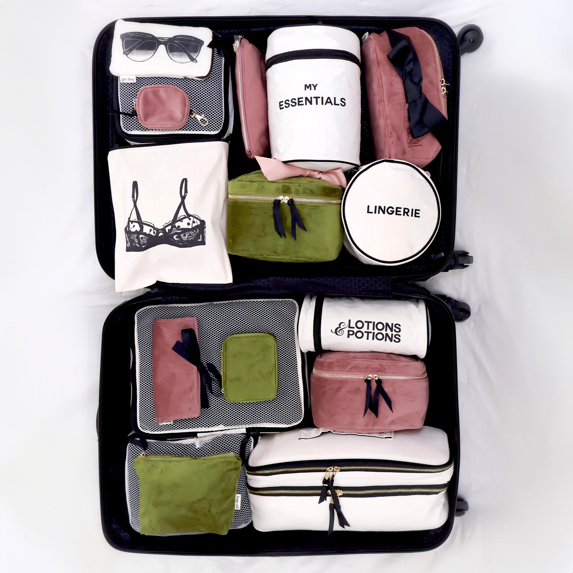 Bag-all My Makeup Cosmetic Box in Green Velvet shown organized in suitcase with travel essentials, beauty pouches, and storage bags for efficient packing and travel organization