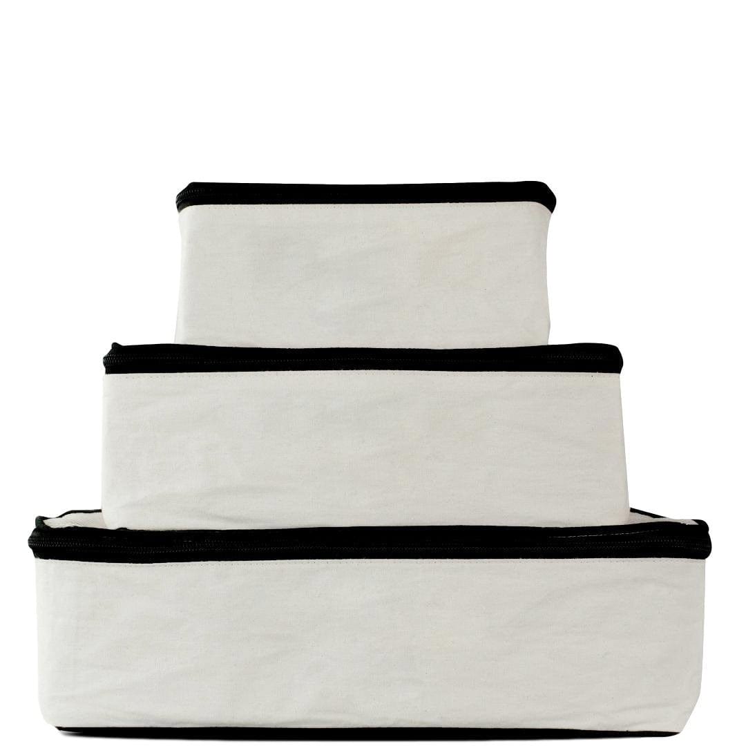 Bag-all Weekend Essential Packing Set 4-Pack in cream cotton - organized travel cubes with black trim for stylish packing and storage