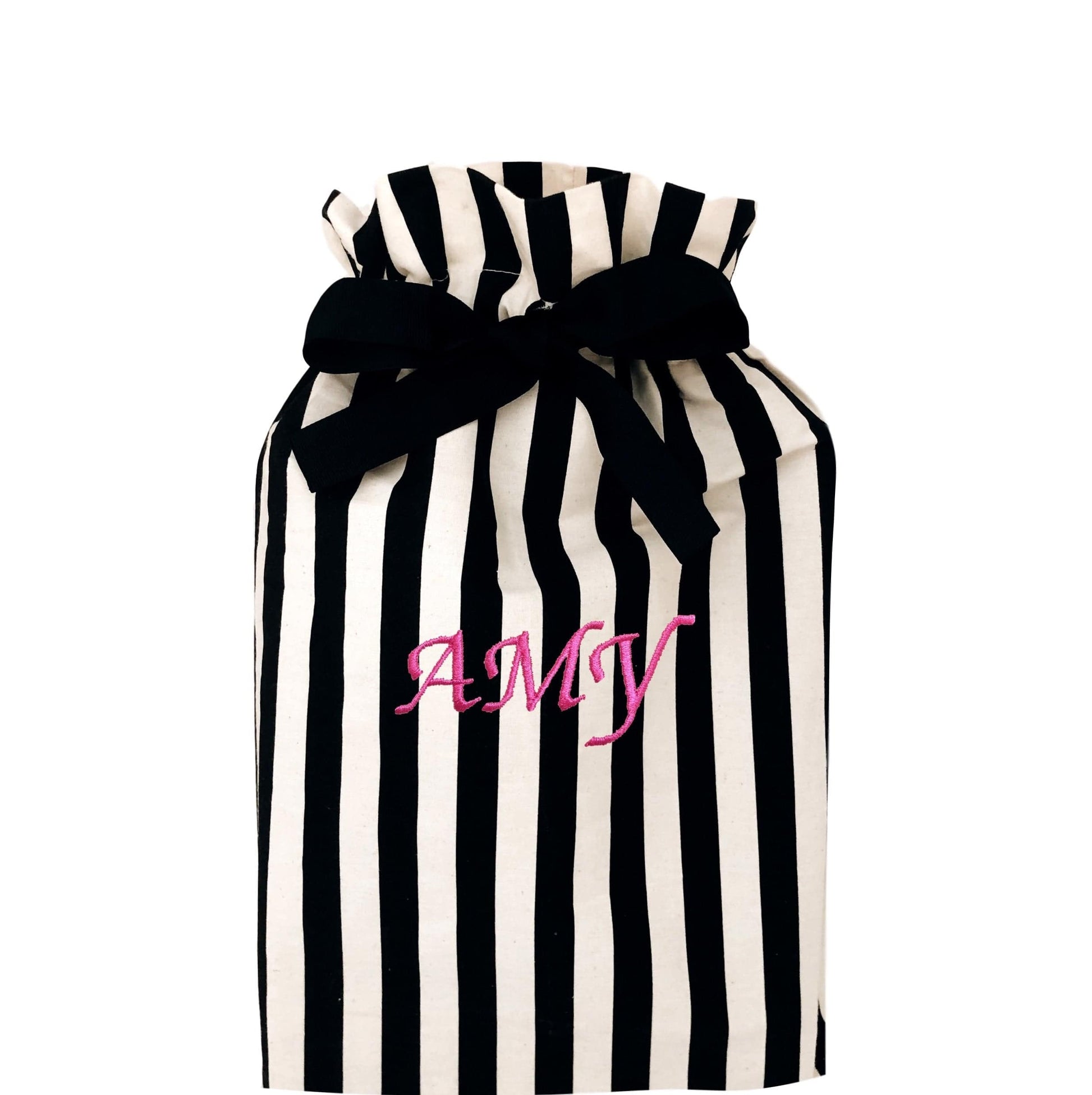 A medium sized striped reusable gift bag with "amy" monogrammed on the front. 