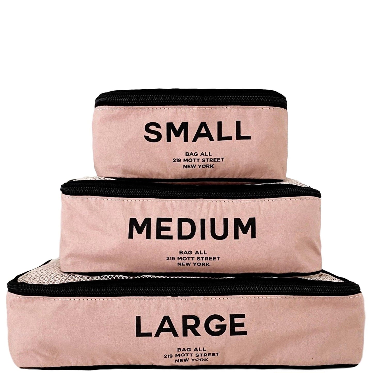 Bag-all Cotton Packing Cubes in Pink/Blush - Set of 3 sizes with mesh top for organized travel storage. Lightweight pink organizers with black trim and clear size labels.