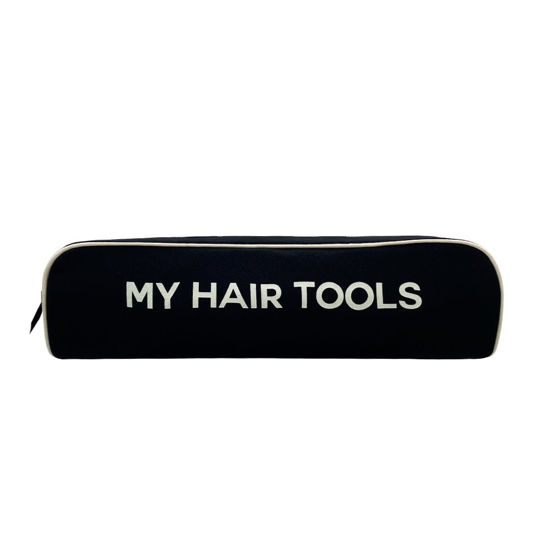 Bag-all Roomy Hair Tools Travel Case in black cotton with white text, heat-resistant lined storage for Dyson Airwrap and styling tools, featuring gold zipper