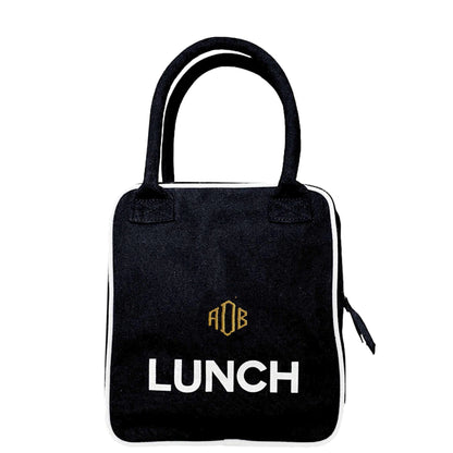 Monogrammed initials with a black lunchbox. 